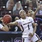 South Carolina guard Zia Cooke (1) shoots against Ole Miss during the first half of an NCAA college basketball game in Columbia, S.C., Thursday, Feb. 25, 2021.  (Tracy Glantz/The State via AP)