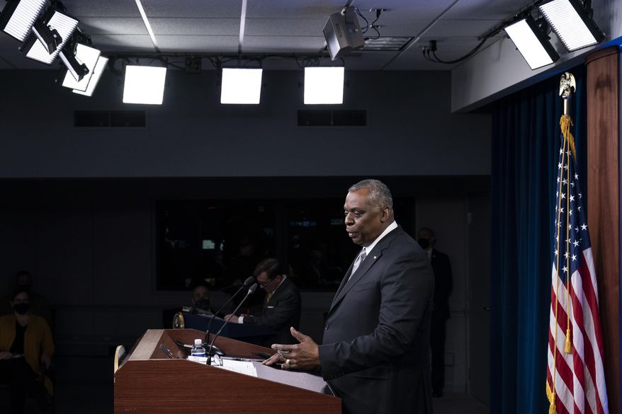 Secretary of Defense Lloyd Austin speaks during a media briefing at the Pentagon, Friday, Feb. 19, 2021, in Washington. (AP Photo/Alex Brandon)