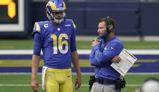 FILE - In this Oct. 4, 2020, file photo, Los Angeles Rams head coach Sean McVay, right, talks to quarterback Jared Goff (16) during the second half of an NFL football game  in Inglewood, Calif. McVay says he cannot talk about Matthew Stafford until the new league year begins in mid-March and the Rams&#x27; blockbuster quarterback trade is official. He is still allowed to talk about Goff, but the coach is not saying much. (AP Photo/Jae C. Hong, File)