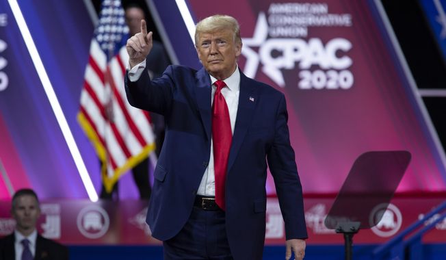 In this Feb. 29, 2020, file photo, President Donald Trump greets the crowd after speaking at Conservative Political Action Conference, CPAC 2020, at the National Harbor, in Oxon Hill, Md., Saturday, Feb. 29, 2020. (AP Photo/Jose Luis Magana) ** FILE **