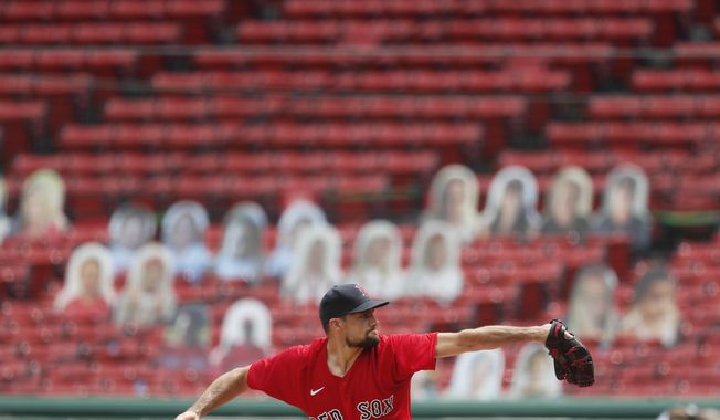 FILE - In this Aug. 9, 2020, file photo, Boston Red Sox starting pitcher Nathan Eovaldi delivers in front of empty stands during the first inning of a baseball game against the Toronto Blue Jays in Boston during the COVID-19 pandemic. The Red Sox announced Thursday, Feb. 25, 2021, that the team is making plans for a limited number of fans to return to Fenway Park for the regular season. (AP Photo/Michael Dwyer, File)