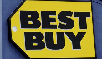 A Best Buy store sign is displayed in Arlington Heights, Ill., Saturday, Feb. 6, 2021. Best Buys is closing five stores in four states in the next month. The retailer plans to close two Richmond, Va., area stores, along with one store each in Syracuse, N.Y., Carbondale, Ill., and Brockton, Mass. (AP Photo/Nam Y. Huh)