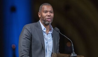 Author Ta-Nehisi Coates speaks during the Celebration of the Life of Toni Morrison in New York on Nov. 21, 2019. Coates, the acclaimed essayist and novelist who expanded the world of Wakanda in Marvel comics, will write the script for a new “Superman” film from Warner Bros. The studio announced Friday that Coates will pen the screenplay for an upcoming “Superman” film that’s early in development. (AP Photo/Mary Altaffer)  ** FILE **