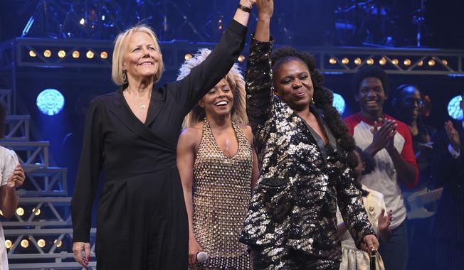 FILE - Director Phyllida Lloyd, left, and playwright Katori Hall take a bow during the curtain call on opening night of &amp;quot;Tina – The Tina Turner Musical&amp;quot; in New York on Nov. 7, 2019. Most playwrights who dip their toes into musical theater for the first time go small. Not Katori Hall: Her first assignment was to capture the life of a musical giant — Tina Turner. (Photo by Evan Agostini/Invision/AP, File)