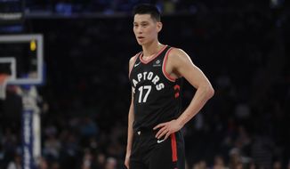 FILE - In this March 28, 2019, file photo, Toronto Raptors&#39; Jeremy Lin stands on the court during the second half of the team&#39;s NBA basketball game against the New York Knicks in New York. Golden State Warriors coach Steve Kerr will support G League guard Lin and is hopeful of an investigation into what discriminatory act caused Lin to speak out about racism facing Asian Americans. In a heartfelt social media post, Lin didn&#39;t go into specifics about what happened except to reference he had been called “coronavirus” on the court. (AP Photo/Frank Franklin II, File)