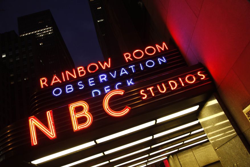 FILE - In this file photo made Nov. 17, 2009, a marquis advertises the Rainbow Room, the Observation Deck, and NBC Studios in New York. NBC News says that one of its technicians has died after testing positive for coronavirus. Larry Edgeworth worked at the network's New York headquarters and died on Thursday, March 19, 2020. (AP Photo/Mark Lennihan, file)
