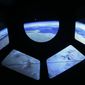 A reproduction of the view of the earth from a spaceship is displayed at the museum of the science and technologies in Milan, Italy, Friday, Feb. 12, 2016. Scientists announced they have finally detected gravitational waves, the ripples in the fabric of space-time that Einstein predicted a century ago. The announcement has electrified the world of astronomy, and some have likened the breakthrough to the moment Galileo took up a telescope to look at the planets. (AP Photo/Luca Bruno)