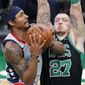 Washington Wizards&#39; Bradley Beal goes up to shoot against Boston Celtics&#39; Daniel Theis (27) during the first half of an NBA basketball game, Sunday, Feb. 28, 2021, in Boston. (AP Photo/Michael Dwyer)