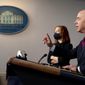 Homeland Security Secretary Alejandro Mayorkas, right, accompanied by White House press secretary Jen Psaki, left, speaks during a press briefing at the White House, Monday, March 1, 2021, in Washington. (AP Photo/Andrew Harnik)