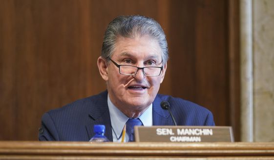 Sen. Joe Manchin, D-W.Va., speaks during a Senate Committee on Energy and Natural Resources hearing on the nomination of Rep. Debra Haaland, D-N.M., to be Secretary of the Interior on Capitol Hill in Washington, Wednesday, Feb. 24, 2021. (Leigh Vogel/Pool via AP) **FILE**