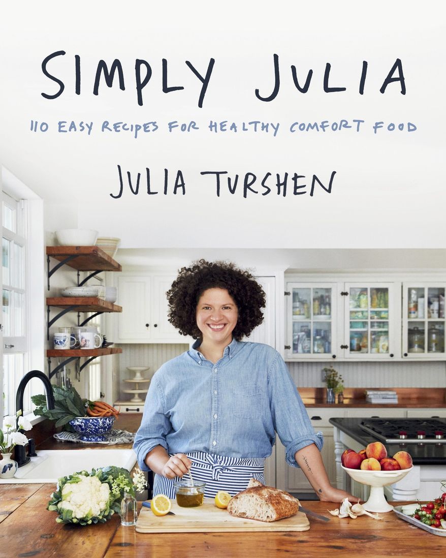 This cover image released by Harper Wave shows "Simply Julia: 110 Easy Recipes for Healthy Comfort Food" by Julia Turshen. Each meal has a strong tie to the people and places close to Turshen’s heart. (Harper Wave via AP)