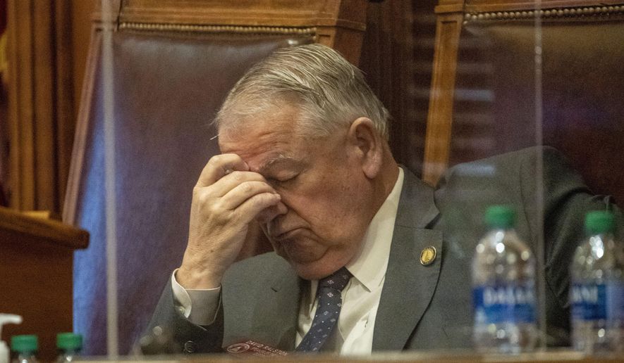 Georgia Speaker of the House David Ralston (R-Blue Ridge) rubs his head as the debate on HB 531 persists in the House Chambers on day 25 of the legislative session at the Georgia State Capitol Building in Atlanta, Monday, March 1, 2021. (Alyssa Pointer/Atlanta Journal-Constitution via AP)