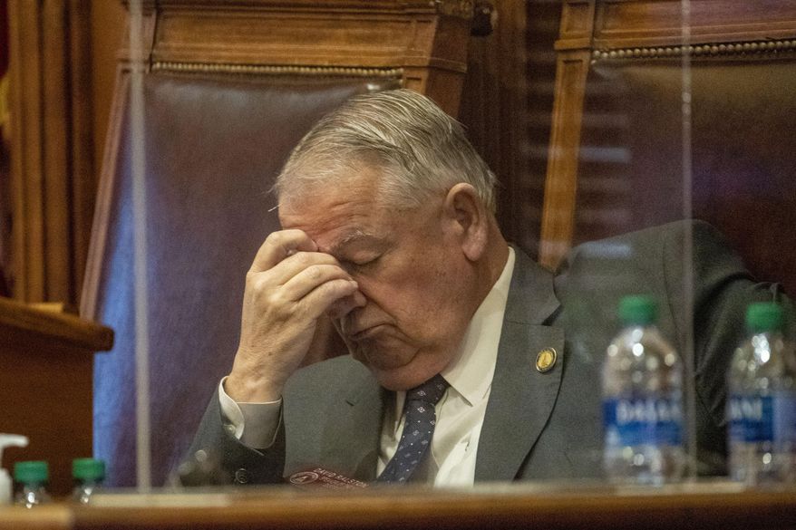 Georgia Speaker of the House David Ralston (R-Blue Ridge) rubs his head as the debate on HB 531 persists in the House Chambers on day 25 of the legislative session at the Georgia State Capitol Building in Atlanta, Monday, March 1, 2021. (Alyssa Pointer/Atlanta Journal-Constitution via AP)