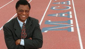 Irv Cross poses at Macalester College in St. Paul, Minn., in this April 8, 1999, file photo. Cross, the former NFL defensive back who became the first Black man to work full-time as a sports analyst on national television, died Sunday, Feb. 28, 2021. He was 81. The Philadelphia Eagles, the team Cross spent six of his nine NFL seasons with, said Cross&#39; son, Matthew, confirmed his father died near his home in Roseville, Minnesota. The cause of death was not provided. (Ann Heisenfelt/Star Tribune via AP)