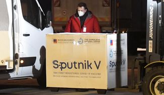 Russia&#39;s Sputnik V coronavirus vaccine arrives at Kosice Airport, Slovakia, Monday March 1, 2021. Hard-hit Slovakia signed a deal to acquire 2 million dozes of Russia’s Sputnik V coronavirus vaccine. The country&#39;s prime minister says Slovakia will get one million shots in next two months while another million will arrive in May and June. (Frantisek Ivan/TASR via AP)