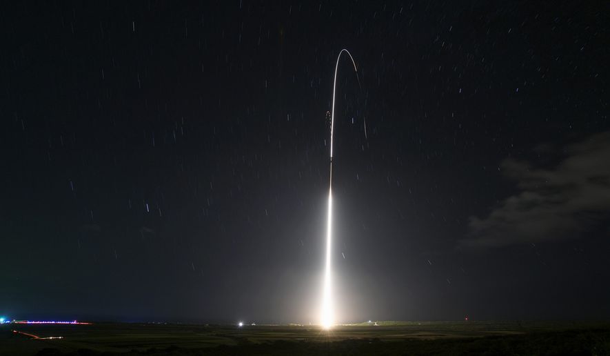 This Dec. 10, 2018, file photo, provided by the U.S. Missile Defense Agency (MDA), shows the launch of the U.S. military&#39;s land-based Aegis missile defense testing system, that later intercepted an intermediate-range ballistic missile, from the Pacific Missile Range Facility on the island of Kauai in Hawaii.  (Mark Wright/Missile Defense Agency via AP)  **FILE**
