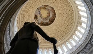 A statue of President George Washington stands in the U.S. Capitol Rotunda, Tuesday, March 2, 2021, in Washington. (AP Photo/Patrick Semansky)
