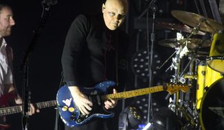 FILE - Billy Corgan of The Smashing Pumpkins performs in concert at the BB&amp;amp;T Pavilion in Camden, N.J., in this Aug. 8, 2019, file photo. Corgan is set to reboot the National Wrestling Alliance, founded in 1948 and the once proud stomping grounds of Ric Flair, Lou Thesz, Harley Race and other wrestling legends, injecting the company with a 21st century flavor.(Photo by Owen Sweeney/Invision/AP)