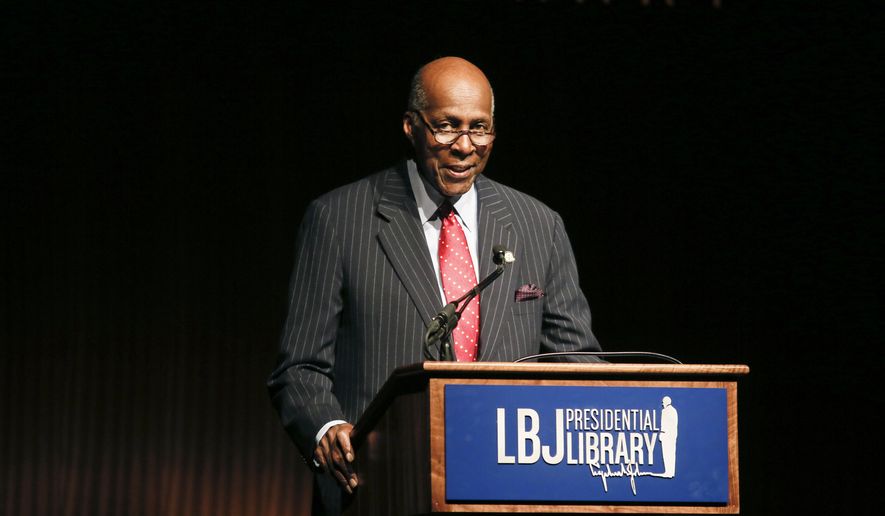 In this April 9, 2014, file photo, civil rights activist Vernon Jordan introduces former President Bill Clinton during the Civil Rights Summit in Austin, Texas. Jordan, who rose from humble beginnings in the segregated South to become a champion of civil rights before reinventing himself as a Washington insider and corporate influencer, died Tuesday, March 2, 2021, according to a statement from his daughter. He was 85. (AP Photo/Jack Plunkett, File)