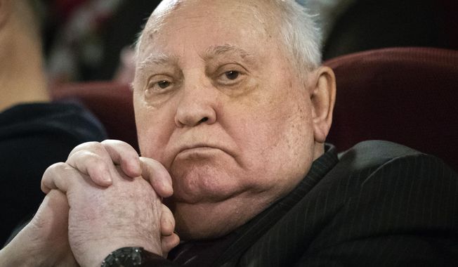 FILE - In this Thursday, Nov. 8, 2018 file photo, former Soviet leader Mikhail Gorbachev attends the Moscow premier of a film made by Werner Herzog and British filmmaker Andre Singer based on their conversations, in Moscow, Russia. Former Soviet leader Mikhail Gorbachev turned 90 on Tuesday March 2, 2021, receiving greetings from the Kremlin and global leaders while Russians remained divided over his legacy. (AP Photo/Alexander Zemlianichenko, File)