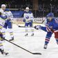 New York Rangers&#39; Chris Kreider (20) scores a second-period goal against the Buffalo Sabres during an NHL hockey game Tuesday, March 2, 2021, in New York. (Bruce Bennett/Pool Photo via AP)