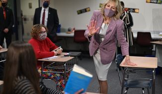 First lady Jill Biden speaks with students as she tours Fort LeBoeuf Middle School in Waterford, Pa., Wednesday, March 3, 2021. (Mandel Ngan/Pool via AP) **FILE**