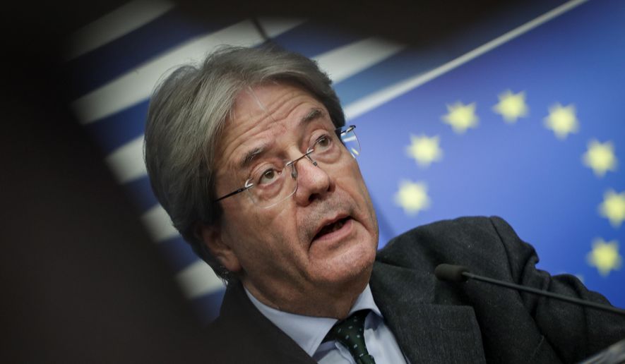 European Commissioner for the Economy Paolo Gentiloni speaks during a media conference, after a virtual Eurogroup meeting, at the European Council in Brussels, Monday, Feb. 15, 2021. (Stephanie Lecocq, Pool via AP)