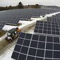 Solar panels stretch across 38 acres at the BNRG/Dirigo solar farm, Thursday, Jan. 14, 2021, in Oxford, Maine. President Joe Biden wants to change the way the U.S. uses energy by expanding renewables, but faces several challenges. (AP Photo/Robert F. Bukaty) ** FILE **