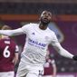 Leicester City&#39;s Kelechi Iheanacho celebrates scoring their side&#39;s first goal during the English Premier League soccer match between Burnley and Leicester City at Turf Moor stadium in Burnley, England, Wednesday, March 3, 2021.(Alex Pantling/Pool via AP)