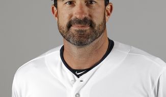FILE - This is a 2016 file photo showing Mickey Callaway of the Cleveland Indians baseball team. Indians president of baseball operations Chris Antonetti said he couldn&#x27;t comment on previous remarks made about Mickey Callaway&#x27;s behavior due to Major League Baseball&#x27;s ongoing investigation into allegations the team&#x27;s former pitching coach sexually harassed women. Antonetti joined manager Terry Francona for his Zoom availability on Wednesday, March 3, 2021, a day after a story by The Athletic said several former Indians employees had come forward in the last month to say the team&#x27;s front office was aware of Callaway&#x27;s actions. (AP Photo/Morry Gash, File)