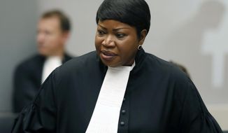 FILE - In this Tuesday Aug. 28, 2018 file photo, Prosecutor Fatou Bensouda at the International Criminal Court (ICC) in The Hague, Netherlands. The Prosecutor of the International Criminal Court said Wednesday, March 3, 2021 that she has launched an investigation into alleged crimes in the Palestinian territories. Fatou Bensouda said in a statement the probe will be conducted “independently, impartially and objectively, without fear or favor.” (Bas Czerwinski/Pool file via AP, File)