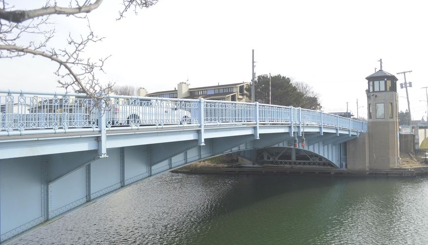 FILE - In this Jan. 14, 2021, file photo, a pickup traverses the Franklin Street bridge in Michigan City, Ind. The historic structure, which was built in the 1930s, will be closed again for repairs in a few weeks and La Porte County officials have begun discussion of its replacement. America’s infrastructure has scored near-failing grades for its deteriorating roads, public transit and storm water systems due to years of inaction from the federal government. (Matt Fritz/The News Dispatch via AP)