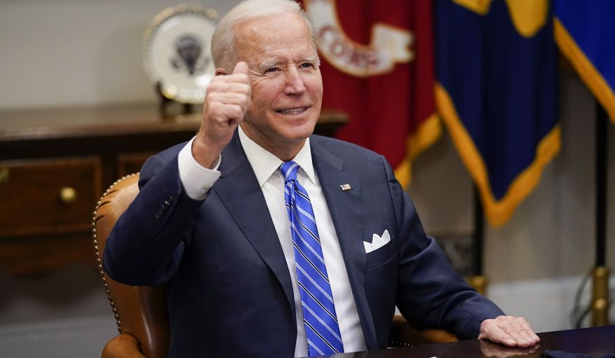 President Joe Biden congratulates NASA&#39;s Jet Propulsion Laboratory Mars 2020 Perseverance team for successfully landing on Mars during a virtual call in the Roosevelt Room at the White House, Thursday, March 4, 2021. (AP Photo/Andrew Harnik)