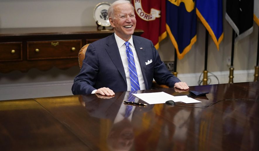 President Joe Biden congratulates NASA&#x27;s Jet Propulsion Laboratory Mars 2020 Perseverance team for successfully landing on Mars during a virtual call in the Roosevelt Room at the White House, Thursday, March 4, 2021. (AP Photo/Andrew Harnik)