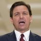 Florida Gov. Ron DeSantis speaks to the press after giving his State of the State speech on the first day of the 2021 Legislative Session in Tallahassee, Fla. Tuesday, March 2, 2021. (Tori Lynn Schneider/Tallahassee Democrat via AP)