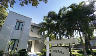In this A home for sale is seen Tuesday, Dec. 8, 2020, in Orlando, Fla.  U.S. long-term mortgage rates were steady to higher this week, Thursday, March 4, 2021, as the benchmark 30-year loan breached the 3% mark for the first time since July 2020.   (AP Photo/John Raoux)