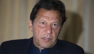 FILE - In this March 16, 2020 file photo, Prime Minister Imran Khan speaks during an interview in Islamabad, Pakistan. Khan will seek a vote of confidence from the National Assembly later this week to prove he enjoys the support of majority in lower house of the parliament despite the defeat of his ruling party&#x27;s key candidate in the Senate&#x27;s elections a day before, a Cabinet minister said, Thursday, March 4, 2021. (AP Photo/B.K. Bangash)