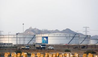 FILE - This Sept. 15, 2019, file photo, shows storage tanks at the North Jiddah bulk plant, an Aramco oil facility, in Jiddah, Saudi Arabia. Yemen&#x27;s Houthi rebels said they struck a Saudi oil facility in the port city of Jiddah on Thursday, March 4, 2021, the latest in a series of cross-border attacks the group has claimed against the kingdom amid the grinding war in Yemen. A Houthi military spokesman, tweeted that the rebels fired a new Quds-2 cruise missile at the facility. He posted a satellite image online that matched Aramco’s North Jiddah Bulk Plant, where oil products are stored in tanks.  (AP Photo/Amr Nabil, File)