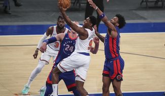 New York Knicks guard RJ Barrett (9) drives to the basket during the third quarter against the Detroit Pistons in an NBA basketball game Thursday, March 4, 2021, in New York. (Wendell Cruz/Pool Photo via AP)