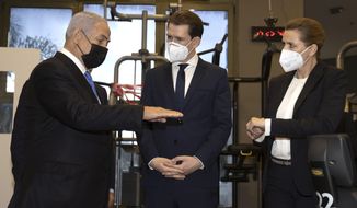 Israeli Prime Minister Benjamin Netanyahu, left, visits a fitness gym with Austrian Chancellor Sebastian Kurz, center, and Danish Prime Minister Mette Frederiksen, to observe how the &amp;quot;Green Pass,&amp;quot; for citizens vaccinated against COVID-19, is used, in Modi&#39;in, Israel, Thursday, March 4, 2021. Frederiksen and Kurz are on a short visit to Israel for to pursue the possibilities for closer cooperation on COVID-19 and vaccines. (Avigail Uzi/Pool via AP)
