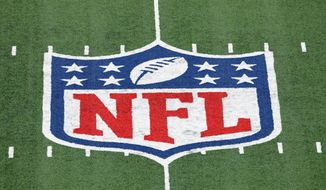 FILE - In this Nov. 2, 2020, file photo,  the NFL logo is displayed  at midfield during an NFL football game between the Tampa Bay Buccaneers and the New York Giants in East Rutherford, N.J. There are some very rich people about to get a whole lot richer. Who else but NFL owners? Probably within the next week, those 32 multi-millionaires/billionaires will see their future earnings increase exponentially. The league is on the verge of extending its broadcast deals with its current partners, and with a new full-time rights holder in Amazon likely acquiring streaming rights. (AP Photo/Adam Hunger, FIle)