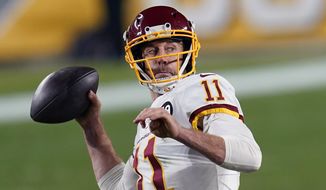 Washington Football Team quarterback Alex Smith (11) plays in an NFL football game against the Pittsburgh Steelers in Pittsburgh, in this Monday, Dec. 7, 2020, photo. (AP Photo/Keith Srakocic) **FILE**