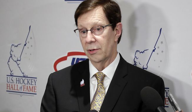 FILE - Nashville Predators general manager David Poile answers questions before being inducted into the U.S. Hockey Hall of Fame in Nashville, in this Wednesday, Dec. 12, 2018, file photo. Just three seasons removed from hoisting the Presidents’ Trophy, the Predators find themselves on the verge of rebuilding. The only question is when does the NHL&#x27;s winningest general manager start tearing down what he&#x27;s built.  David Poile says he wants to see how the Predators fare over a stretch against the Central Division&#x27;s best. (AP Photo/Mark Humphrey, File)