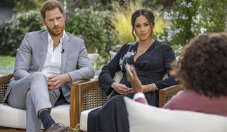 This image provided by Harpo Productions shows Prince Harry, left, and Meghan, Duchess of Sussex, in conversation with Oprah Winfrey. &amp;quot;Oprah with Meghan and Harry: A CBS Primetime Special&amp;quot; airs March 7, 2021. Britain’s royal family and television have a complicated relationship. The medium has helped define the modern monarchy: The 1953 coronation of Queen Elizabeth II was Britain’s first mass TV spectacle. Since then, rare interviews have given a glimpse behind palace curtains at the all-too-human family within. (Joe Pugliese/Harpo Productions via AP, File)