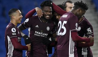 Leicester&#39;s Daniel Amartey, 2nd right, is congratulated by his teammates after scoring his side&#39;s second goal during the English Premier League soccer match between Brighton &amp;amp; Hove Albion and Leicester City at the AMEX Stadium in Brighton, England, Saturday, March 6, 2021. (Neil Hall/Pool via AP)