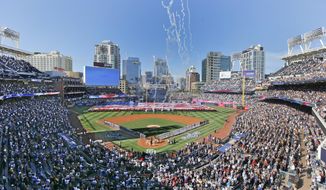 In this April 4, 2016, file photo, opening day ceremonies are performed at Petco Park before a baseball game between the Los Angeles Dodgers and the San Diego Padres in San Diego. California officials will allow people to attend Major League Baseball games and other sporting events, go to Disneyland and watch live performances in limited capacities starting April 1, 2021. The rules announced Friday, March 5, 2021, coincide with baseball&#39;s opening day. (AP Photo/Lenny Ignelzi, File)