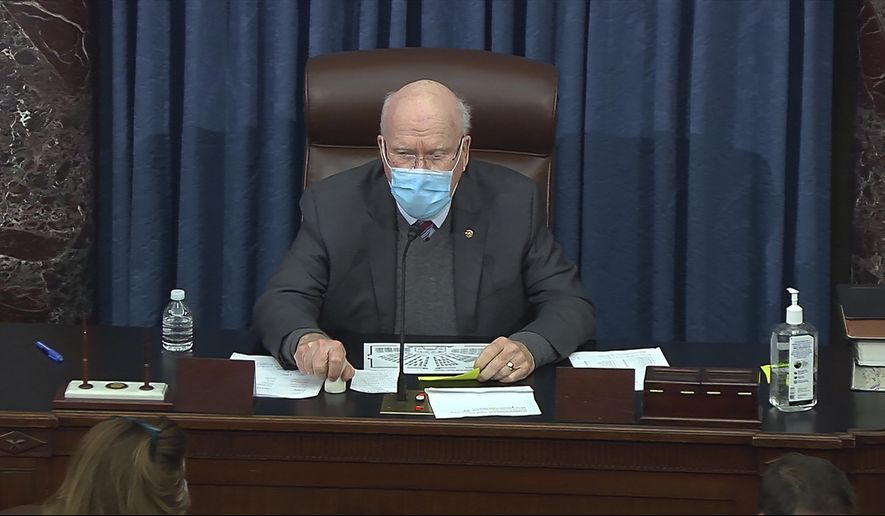 In this image from video, Sen. Patrick Leahy, D-Vt., the president pro tempore of the Senate, presides during debate on the Senate COVID-19 relief bill in the Senate at the U.S. Capitol in Washington, Saturday, March 6, 2021. (Senate Television via AP)