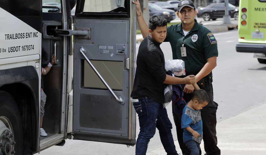 Immigrants are released after processing by U.S. Customs and Border Protection, often not aware that they may be spreading the coronavirus. (Associated Press)
