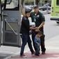 Immigrants are released after processing by U.S. Customs and Border Protection, often not aware that they may be spreading the coronavirus. (Associated Press)