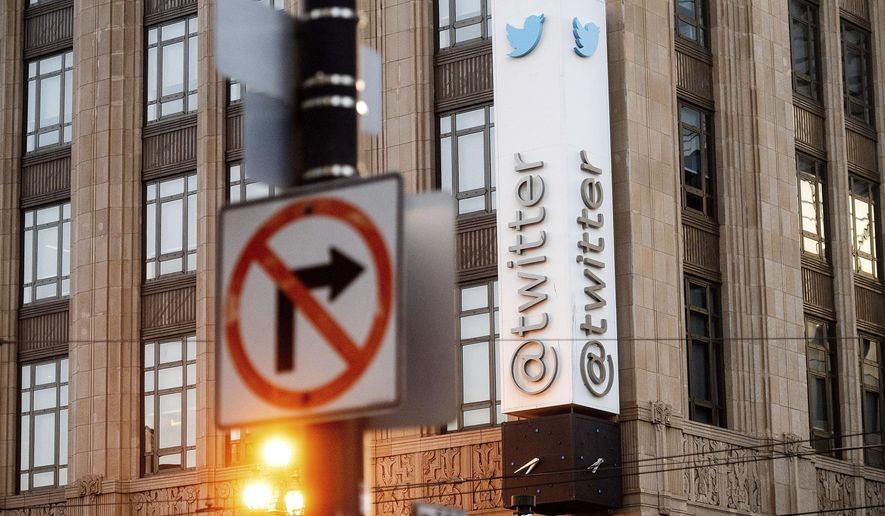 FILE - In this Jan. 11, 2021, file photo, a sign hangs at Twitter headquarters in San Francisco. Republican state lawmakers are pushing for social media giants to face costly lawsuits for policing content on their websites, taking aim at a federal law that prevents internet companies, like Twitter, from being sued for removing posts. (AP Photo/Noah Berger, File)